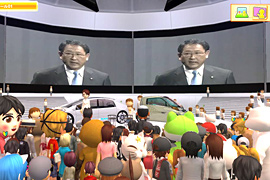 リアル豊田社長（スクリーンに映っている画像）